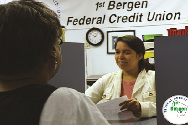 1st Bergen credit union member service rep helping a member