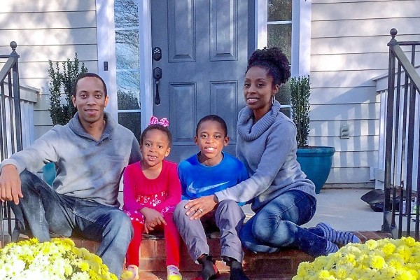 McCormick Family - LGFCU Members posing in front of their house
