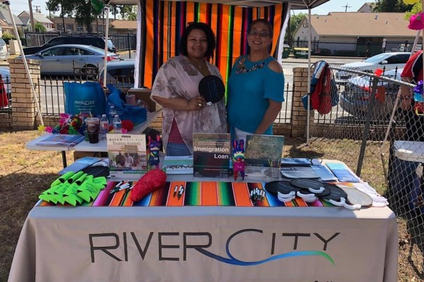 Two River City FCU staff tabling at a community event