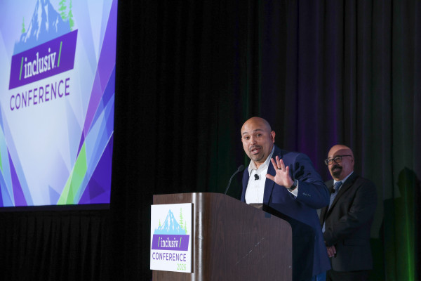 Juan Fernandez on stage at Inclusiv conference