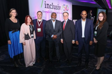 Inclusiv's team poses with investors in and supporters of our Fund.